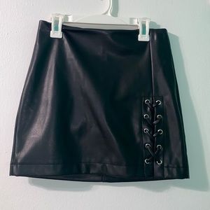 Black leather mini skirt with left side detail